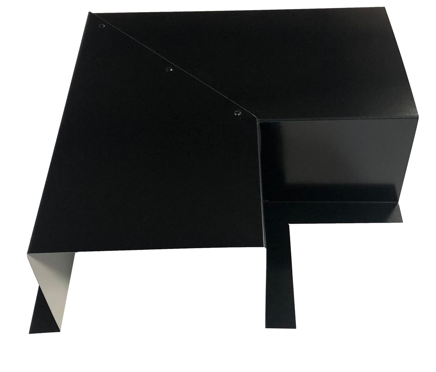 A black, angular metal object with sharp edges and a geometric design. It features a flat top surface and an L-shaped bottom section. The overall appearance is modern and industrial, with smooth surfaces and a minimalist aesthetic, ensuring easy installation for Perma Cover Residential Series - Line Set Cover Side Turning Elbows - Premium Quality in HVAC line sets.