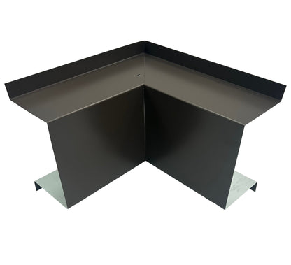 A black, metal Residential Series - Line Set Cover Inside Corner Elbows - Premium Quality with a right-angle design, ideal for HVAC installations. The Perma Cover piece has flat extensions on the top and bottom for attachment, with a sleek, modern finish.