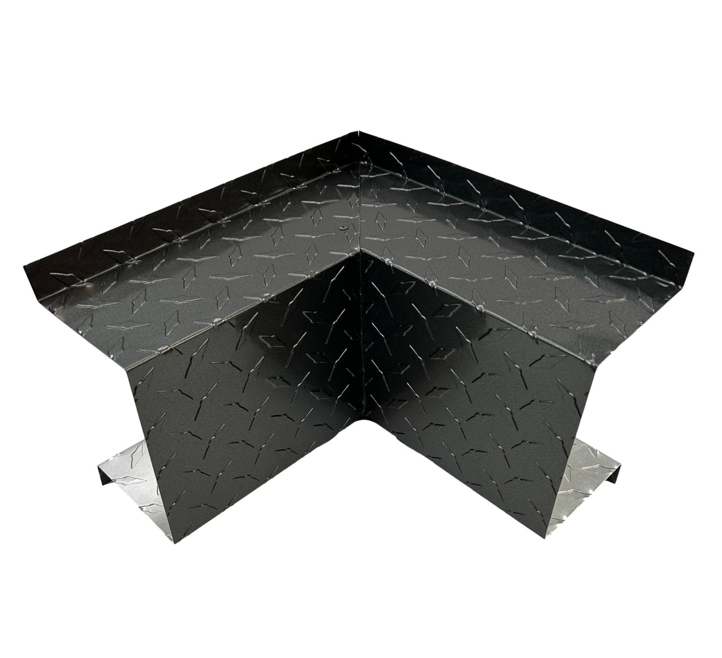 An angular, black metal Residential Series - Line Set Cover Inside Corner Elbows - Premium Quality by Perma Cover with a diamond plate pattern, designed to protect wall corners during HVAC installations. The guard is shown standing upright, highlighting its folded shape and textured surface.