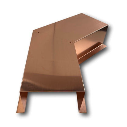 A PermaCover Metal HVAC Line Set Cover 45° Side Turning Elbow that is made to attach to exterior walls to cover existing HVAC line sets. The elbow is made from Pure Copper.