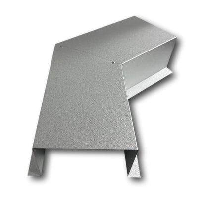 A PermaCover Metal HVAC Line Set Cover 45° Side Turning Elbow that is made to attach to exterior walls to cover existing HVAC line sets. The elbow is made from 22 Gauge Galvalume Steel.