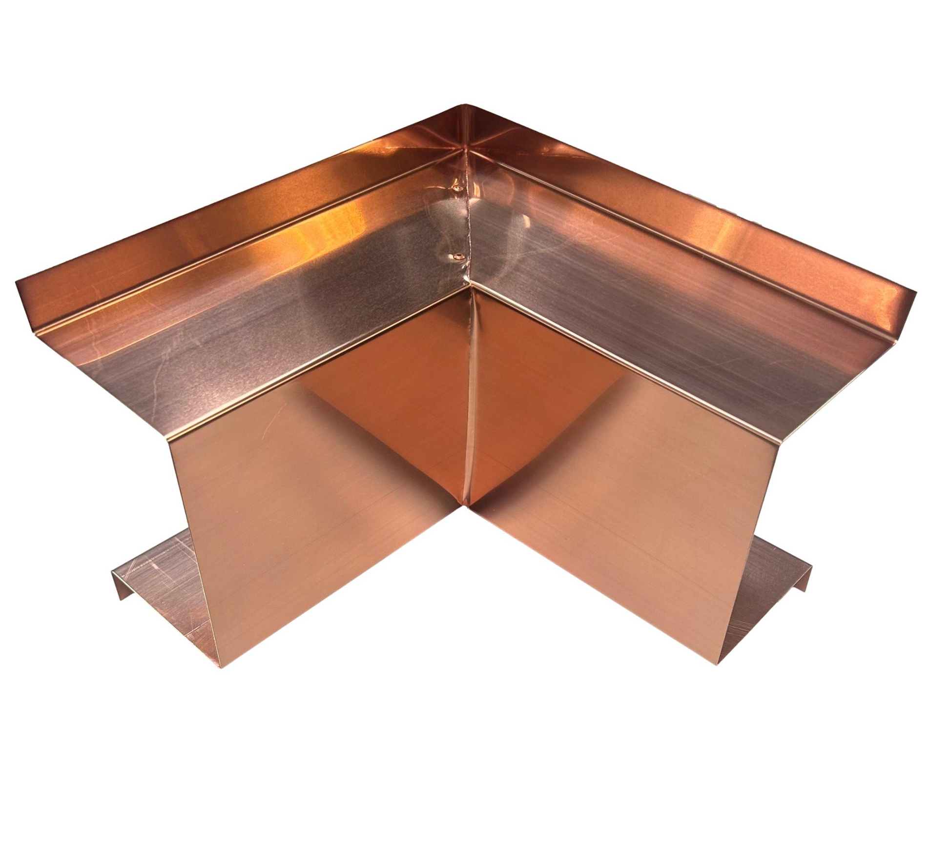 A Perma Cover Residential Series - Line Set Cover Inside Corner Elbows - Premium Quality, typically used in construction or roofing, with a right-angle design and flanges on both ends. It's ideal for HVAC installations and line set covers. The metallic surface reflects light, highlighting its smooth and shiny appearance.