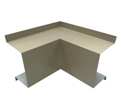 A beige piece of Perma Cover Residential Series - Line Set Cover Inside Corner Elbows - Premium Quality bent at a 90-degree angle, forming an "L" shape. Ideal for roofing or siding to prevent water infiltration, it features slightly raised top edges and a smooth surface with visible bends and folds. This Perma Cover Residential Series can also be used in HVAC installations, such as around inside corner elbows.