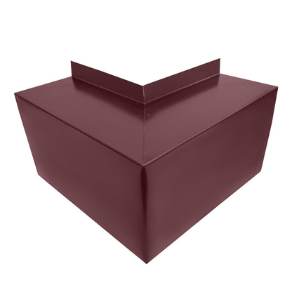 A maroon-colored, V-shaped metal object with clean lines and smooth surfaces, designed for simple and easy installation over a right-angle corner. This Perma Cover Residential Series - Line Set Cover Outside Corner Elbows - Premium Quality features a triangular front surface and an extended narrow strip along the top edge, perfect for an HVAC line set cover.