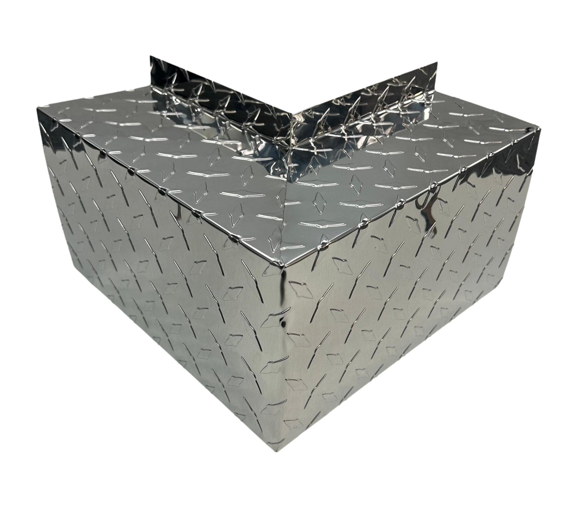 A shiny, L-shaped metal cover with a diamond plate pattern that offers Perma Cover Residential Series - Line Set Cover Outside Corner Elbows - Premium Quality. The cover has sharp edges and a reflective surface, designed likely for protective or decorative purposes. Its diamond plate texture features raised, interlocking lines for added grip and durability.