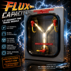 Flux Capacitor 1.21 Gigawatt Time Travel Module with illuminated Y-shaped energy tubes inside a stainless steel enclosure for novelty display.