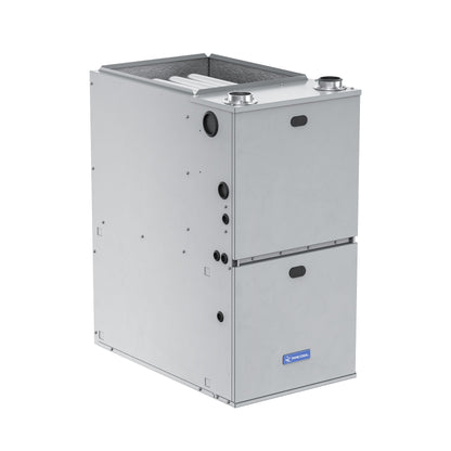 The MRCOOL VersaPro 80k BTU 96% AFUE Gas Furnace, model MGM96EE080B3NB, is a silver, rectangular unit featuring an impressive 96% AFUE efficiency. It includes black circular and rectangular openings, various connection points, and an access panel on the front. This two-stage system by Mr Cool is designed for optimal indoor climate control.