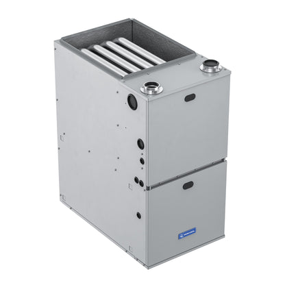 The MRCOOL VersaPro 120k BTU 96% AFUE Gas Furnace, MGM96EE120D5NB by Mr Cool is a grey, metal unit with multiple horizontal pipes in the top section and a solid lower section. This freestanding furnace boasts high efficiency at 96% AFUE and features various connection ports, vents, and panels. It has a compact, rectangular design and includes a two-stage motor.