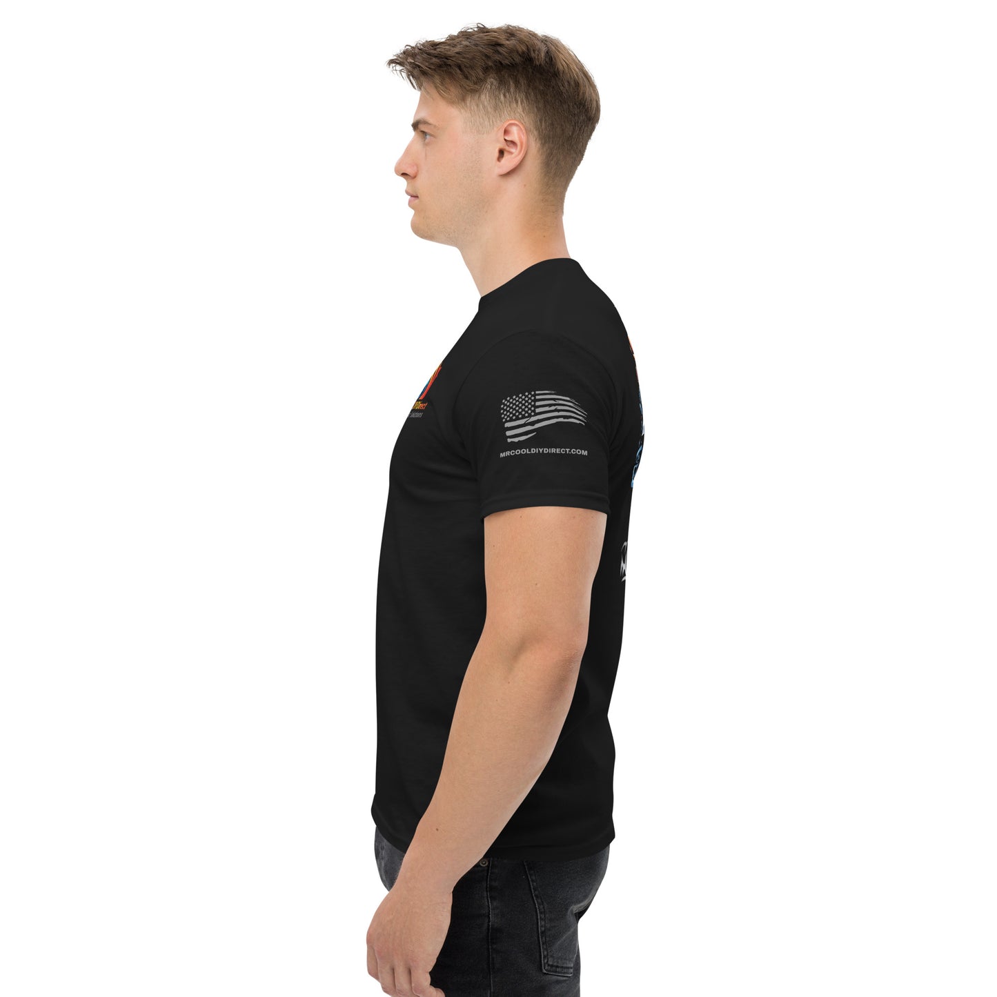A side view of a young man wearing an Exclusive HVAC-Themed Custom Tee by MRCOOL DIY Direct with a logo and an American flag design on the sleeve. He is facing left with a neutral expression.