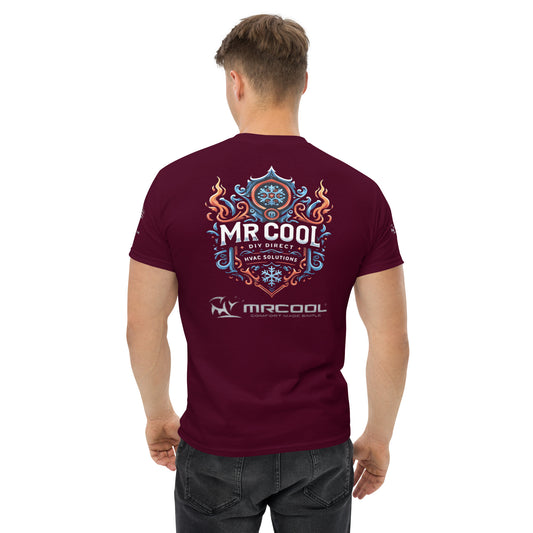 A man viewed from behind, wearing a dark red Exclusive HVAC-Themed Custom Tee from MRCOOL DIY Direct with a vibrant blue and white "Mr Cool" graphic design on the back, paired with dark jeans.