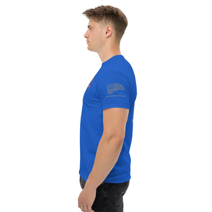 A young man in a custom-designed Exclusive HVAC-Themed Custom Tee by MRCOOL DIY Direct and black jeans stands in profile against a white background, showing the side and sleeve design of his shirt.