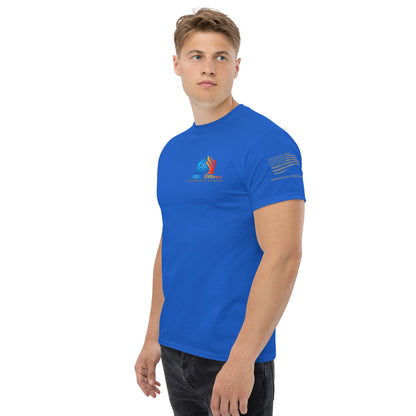 A young man in an Exclusive HVAC-Themed Custom Tee by MRCOOL DIY Direct stands looking to the side against a plain white background. The shirt features stripe details on one sleeve.