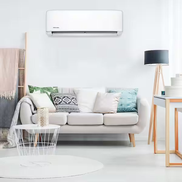 Ductless mini split heat pump system installed in a modern home with indoor air handler and outdoor condenser for energy-efficient heating and cooling.