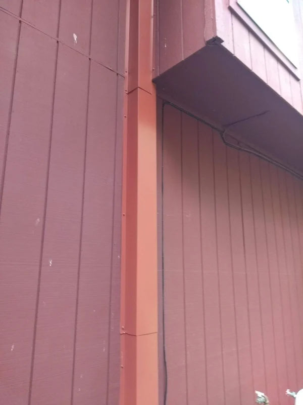 Custom-colored PermaCover metal line set covers matched to home exterior