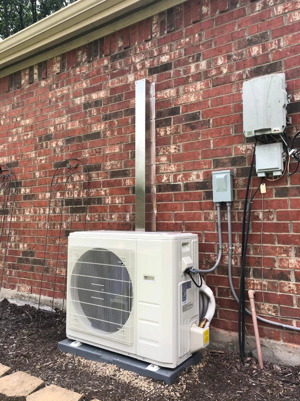 Finished HVAC installation using PermaCover metal line set covers